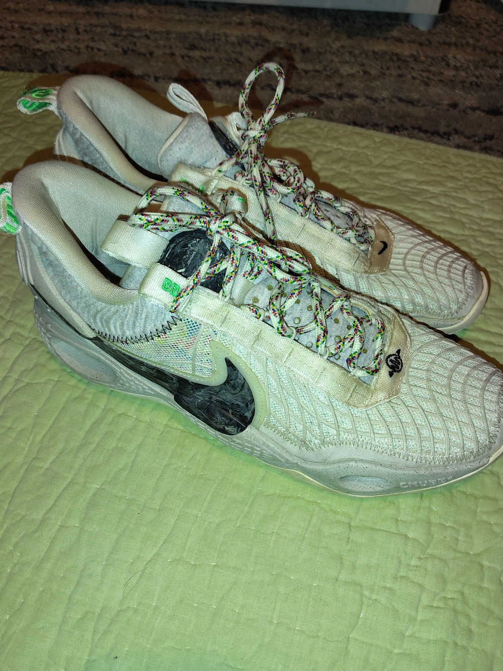 Nike White Athletic Sneakers with Black Swoosh and Multicolor Accent Laces